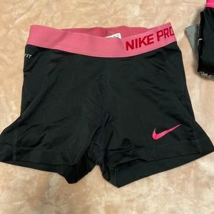 Pink band+ pink Nike sign Nike pro shorts